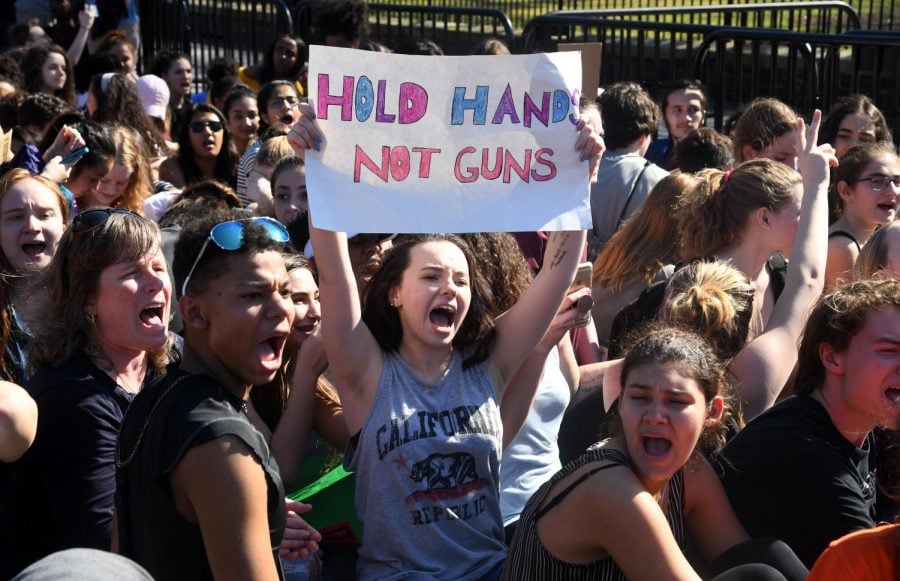 Hundreds+of+high+school+and+middle+school+students+gather+in+front+of+the+White+House+Feb.+21+in+support+of+gun+control+in+the+wake+of+the+Florida+shooting.+Students%2C+faculty+and+administrators+are+planning+demonstrations+Wednesday+to+push+for+gun+reform+and+honor+victims+of+gun+violence.