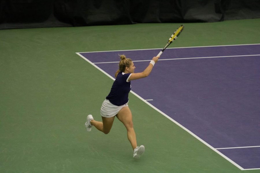 Alex Chatt strikes a forehand. The junior and Northwestern capped a perfect conference season with this weekend’s wins.
