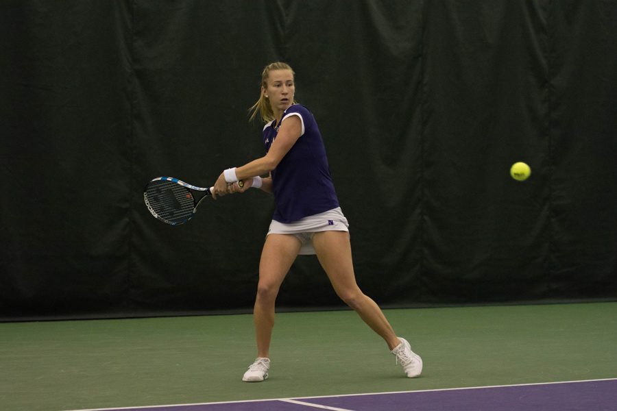 Maddie+Lipp+readies+to+hit+the+ball.+The+senior+helped+Northwestern+earn+a+6-1+Senior+Day+win+over+Minnesota+on+Sunday.+%0A