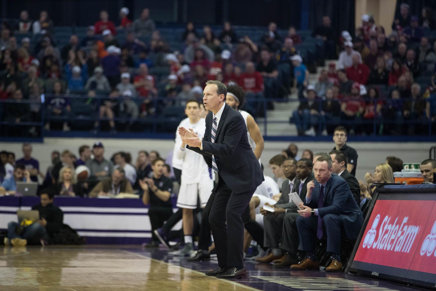 Chris+Collins+coaches+from+the+bench.+On+Monday%2C+he+added+a+new+coach+to+his+staff+to+help+lead+Northwestern+next+season.