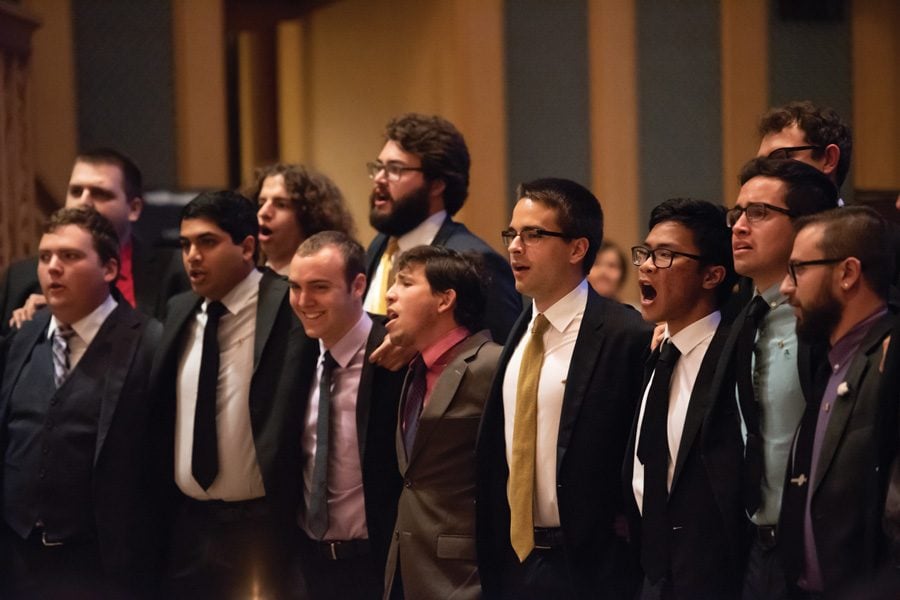 Members of Phi Mu Alpha perform at a memorial service for Ananya Agrawal, a Weinberg senior who died Saturday night. More than 100 community members gathered in Alice Millar Chapel on Wednesday evening for the service. 