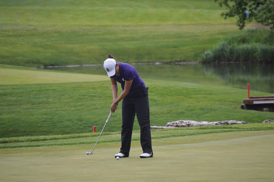 Hannah Kim hits a putt. Kim will look to propel NU to a national championship in Oklahoma.