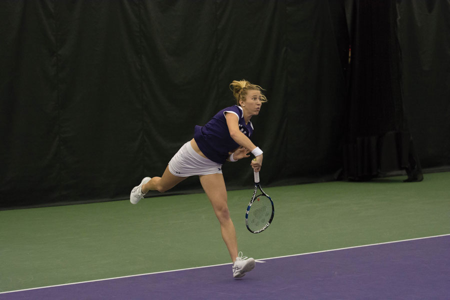 Maddie+Lipp+watches+her+shot.+Lipp+and+fellow+senior+Erin+Larner%E2%80%99s+doubles+match+loss+put+Northwestern+down+early+to+Duke.