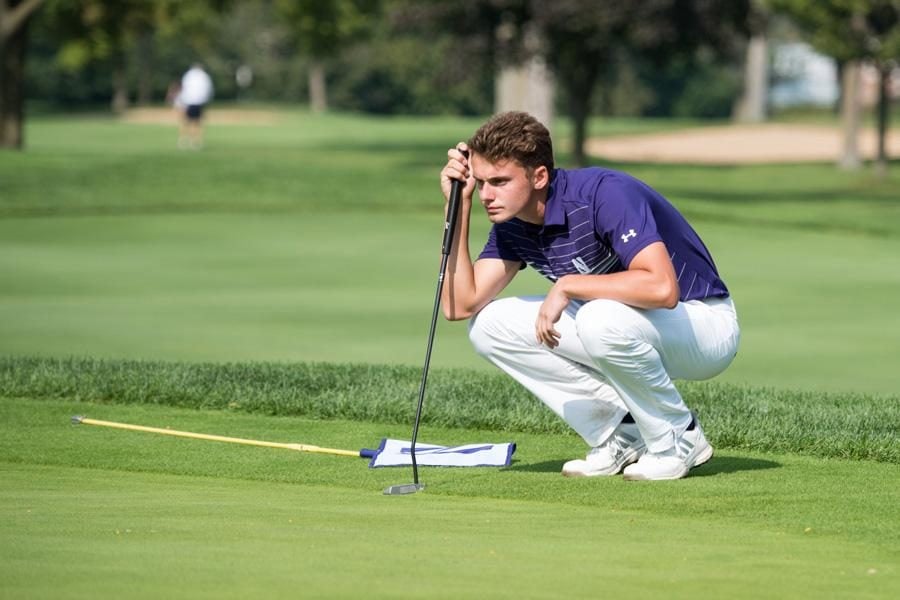 Ryan Lumsden lines up a putt. The senior men’s golf player represented his home country of Scotland at the 2018 U.S. Open in Shinnecock Hills. 