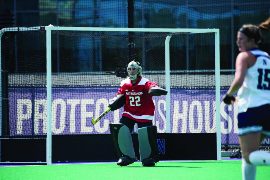 Annie Kalfas directs her defenders. The junior goaltender said the Wildcats will have last year’s losses to Michigan on their minds when they play the Wolverines on Friday.