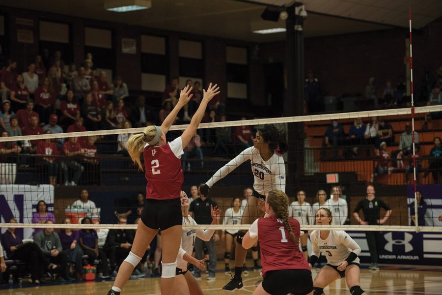 Alana Walker strikes a ball. The sophomore middle hitter leads the team with 49 blocks on the season.