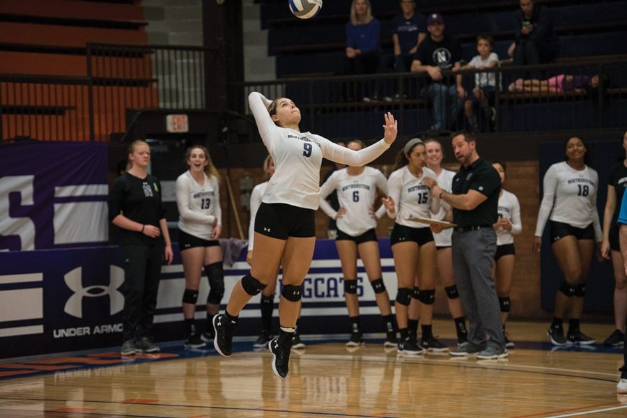 (Daily file photo by Katie Pach) Sarah Johnson attempts a serve. The junior libero had 14 digs against Purdue.