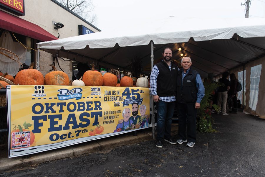  Father-and-son pair Thomas and Kosta Douvikas pose in front at the front of the Oktober Feast tent. D&D Finer Foods held the event to celebrate 45 years of business. 
