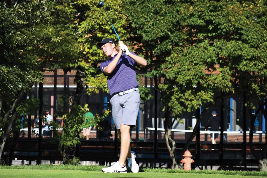 Eric McIntosh drives a golf ball. The sophomore finished in the top-10 at the Marquette Invitational.