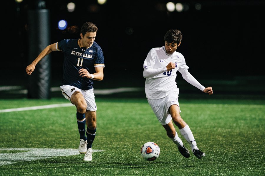 Tommy Katsiyiannis fights for loose ball. The sophomore midfielder played 76 minutes against Notre Dame.
