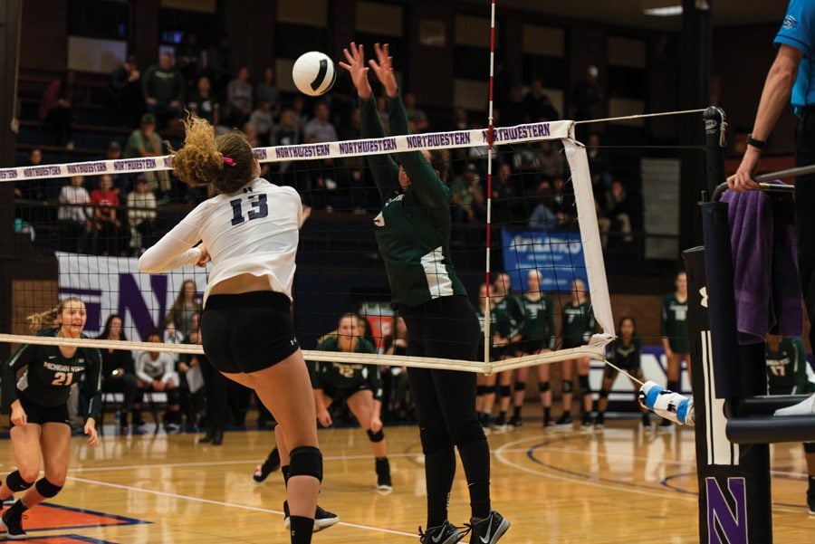 Olivia Viscuso hits the ball. The junior middle blocker has played in 21 games for the Wildcats this season.