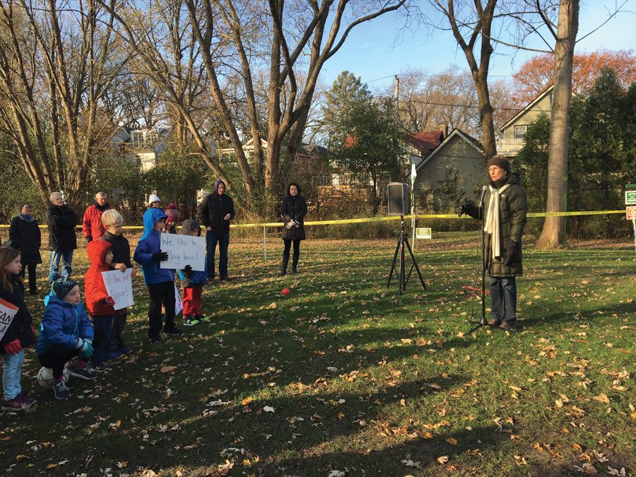 Ald. Eleanor Revelle (7th) speaks at a rally protesting a proposed easement at the Canal Shores Golf Course. The easement would harm the area’s ecology and “effectively destroy” the freeway.