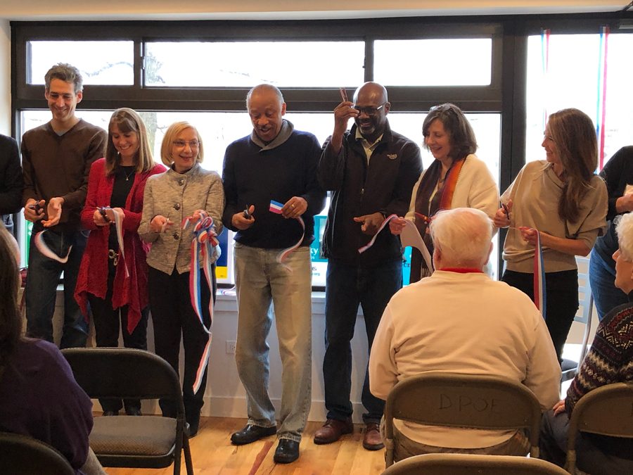 Politicians during the ribbon-cutting ceremony at the new DPOE office. The Democratic Party of Evanston relocated to a bigger office space early this month. 