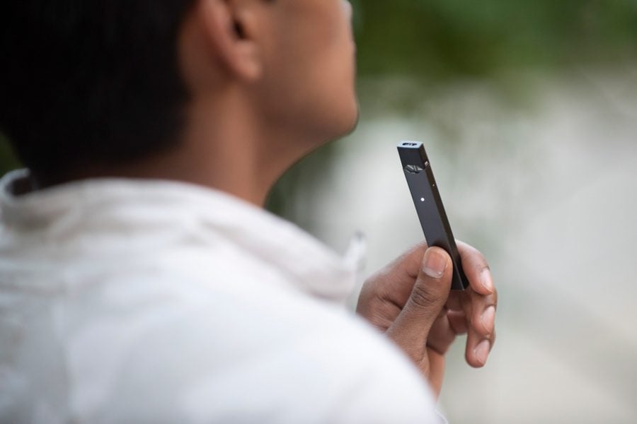 A student using a Juul.