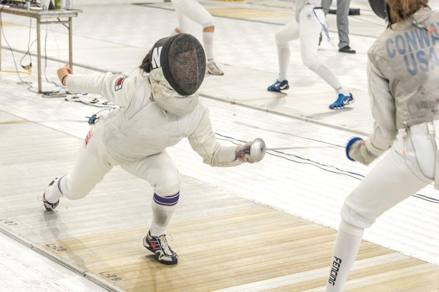 A Northwestern fencer attacks their opponent. The Wildcats left New York with a 8-0 record this weekend. 