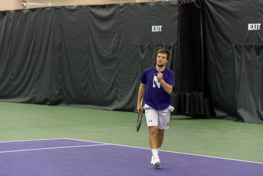 Dominik+Stary+pumps+his+first.+The+junior+helped+NU+secure+its+first+doubles+point+of+the+season.