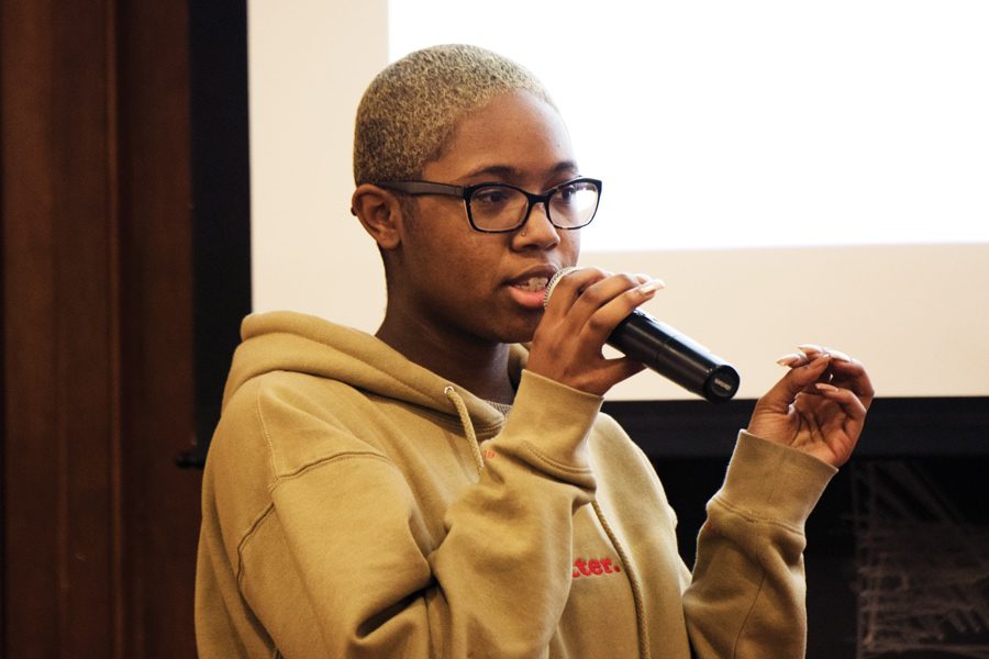 Medill first-year Imani Harris speaks at a town hall on Wednesday held to discuss the presence of controversial visiting scholar Satoshi Kanazawa at NU. The students at the town hall presented demands for the University and strategized for future action.