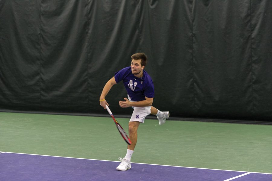Nick Brookes connects with a backhand. The sophomore lost his singles match last week in three sets.