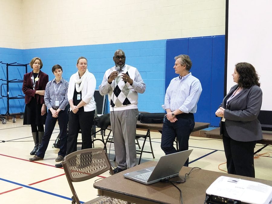 Ald. Donald Wilson (4th), Evanston Public Library director Karen Danczak Lyons, Parks, Recreation and Community Services Director Lawrence Hemingway and the city’s senior management analyst Kate Lewis-Lakin address concerns from Evanston residents.