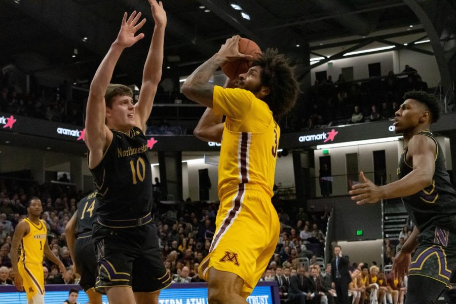 Jordan Murphy puts up a shot. Murphy and the Golden Gophers left Evanston with the victory,