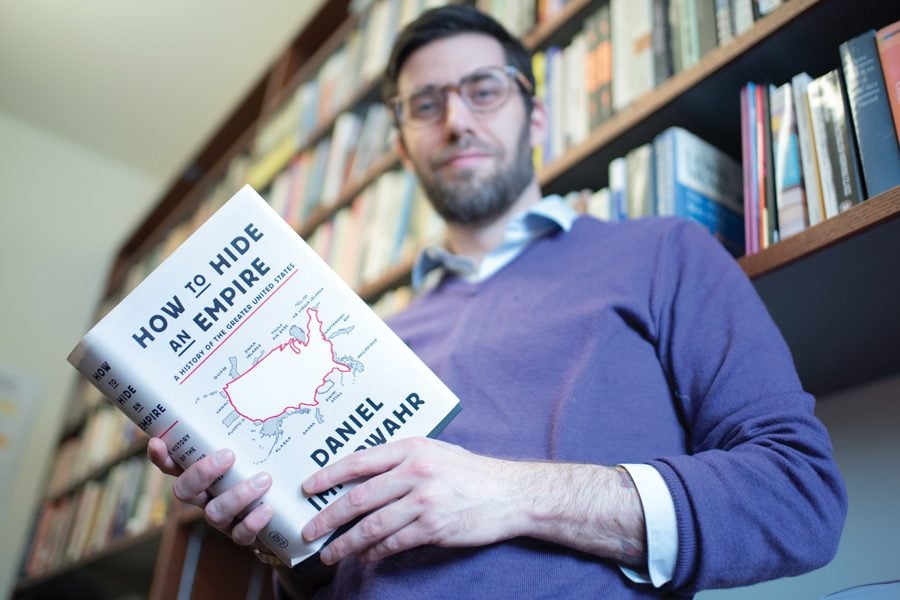 History Prof. Daniel Immerwahr with his new book “How to Hide an Empire.” Immerwahr said Americans need to consider U.S. territories when thinking about the history of the United States.