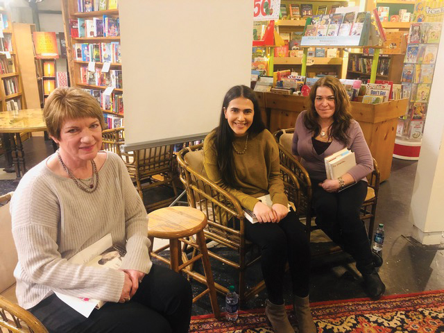 Jeanie Marie Laskas, Noor Abdelfattah and Tracy LaRock smile at Bookends & Beginnings. Laskas read from her new book “To Obama: With Love, Joy, Anger and Hope.”