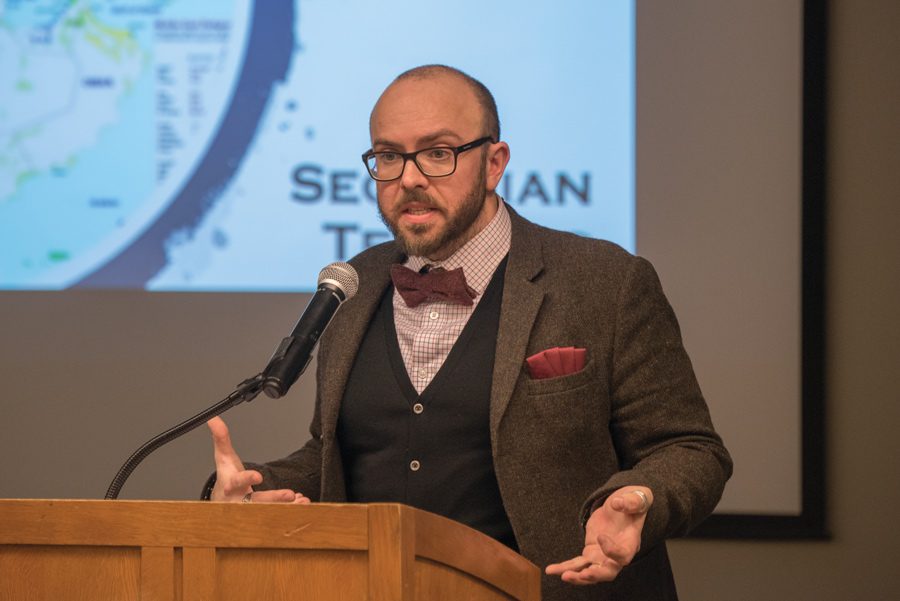 Simon Mabon speaks to a crowd of about 90 on Monday night. Mabon evaluated 30 years of history to deconstruct relations between Saudi Arabia and Iran