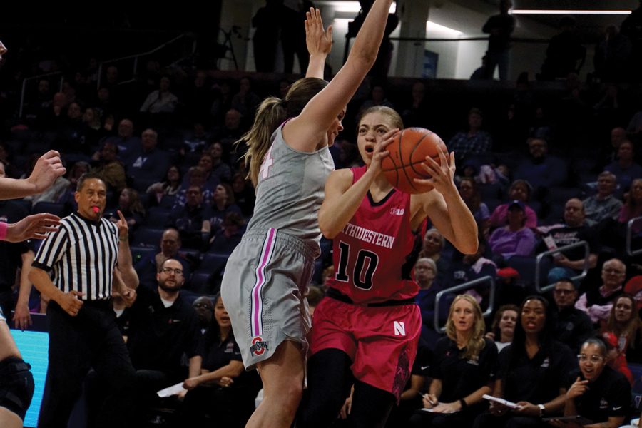 Lindsey Pulliam tries to work through traffic. The sophomore guard scored 16 points in Sunday’s loss against Purdue.