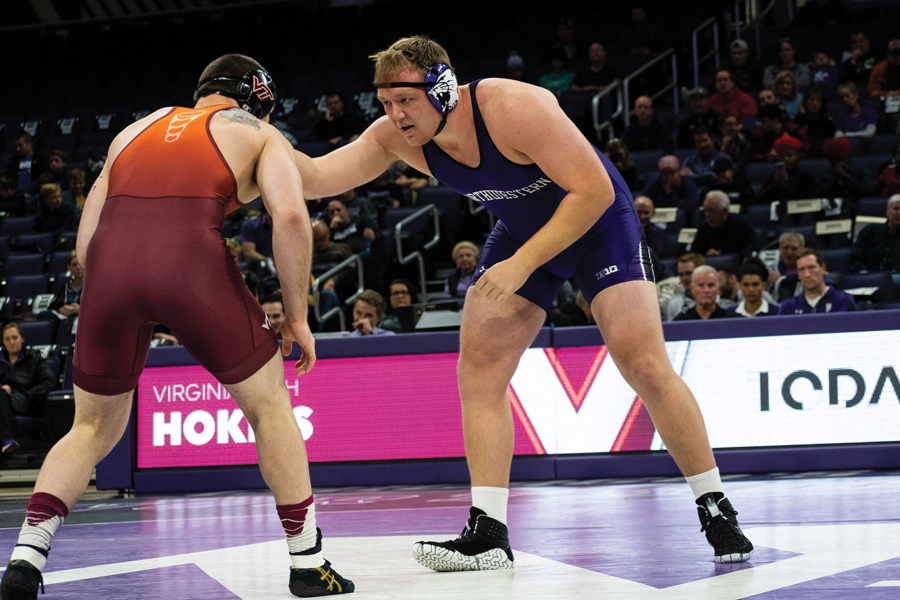 Conan+Jennings+prepares+to+take+down+an+opponent.+The+senior+won+his+bout+against+Ohio+State+last+weekend.+