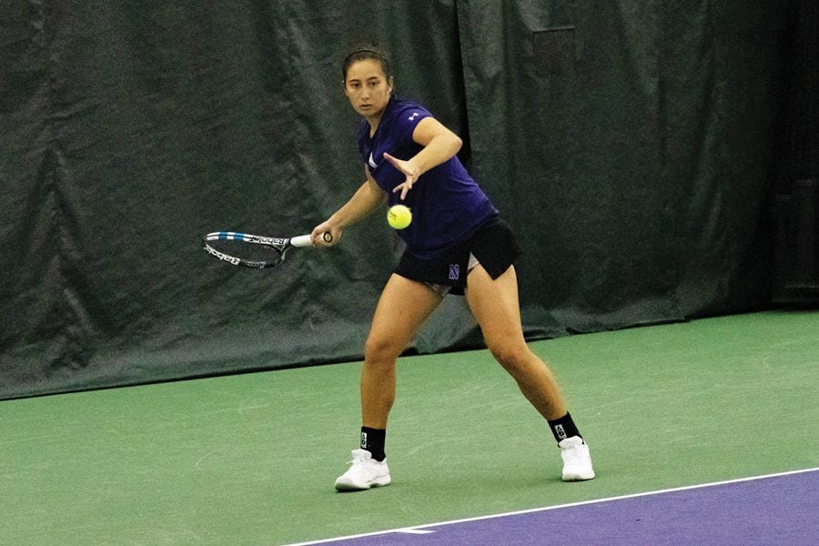 Lee Orr hits a forehand. The Wildcats split their two results this weekend