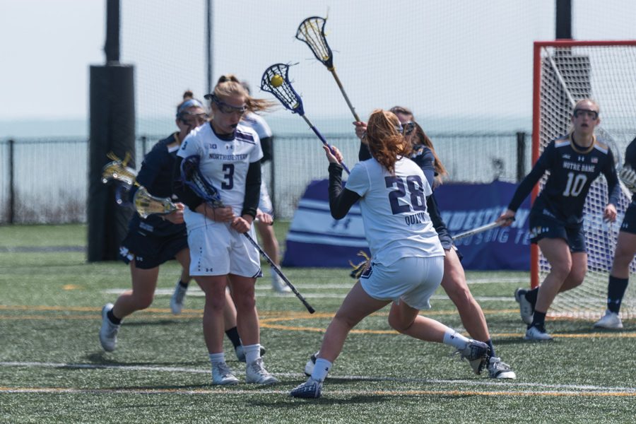 Claire Quinn makes a pass. The Wildcats play No. 1 Boston College this weekend