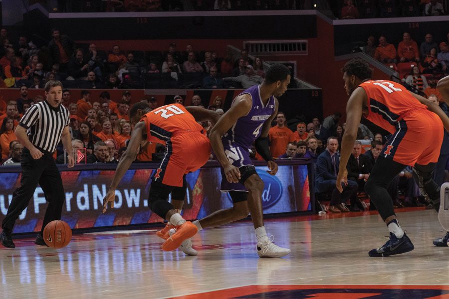 Vic Law loses the ball. The Fighting Illini pressed Northwestern throughout the game. 