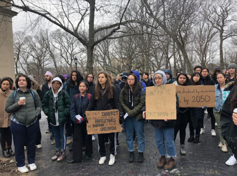 Students participate in the global climate change strike on Friday. Though strike was part of an international movement, student organizers wrote demands targeted at Northwestern policy as well