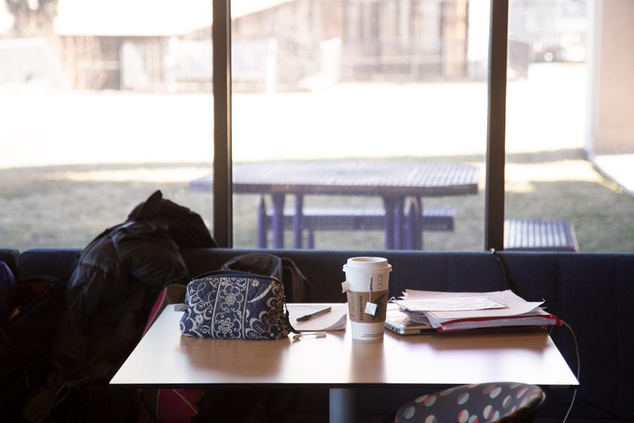 A student’s belongings sit unattended in Norbucks. The question, “Watch my stuff?” is an easy way for students to feel safe leaving their things behind while running out. 
