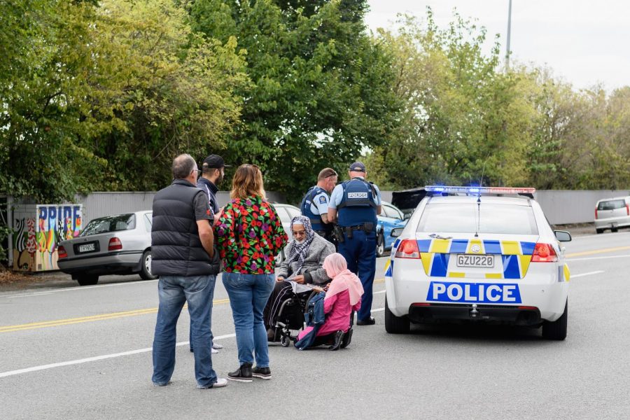 Members of the public react in front of the Masjd Al Noor Mosque as they fear for their relatives on March 15, 2019 in Christchurch, New Zealand. 49 people have been confirmed dead and more than 20 are injured following attacks at two mosques in Christchurch. 