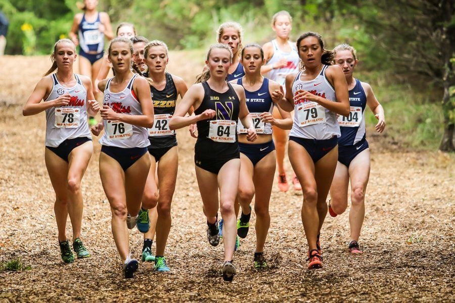 Audrey Roberts leads a pack of runners. The junior will go for two-time All-American status this weekend.