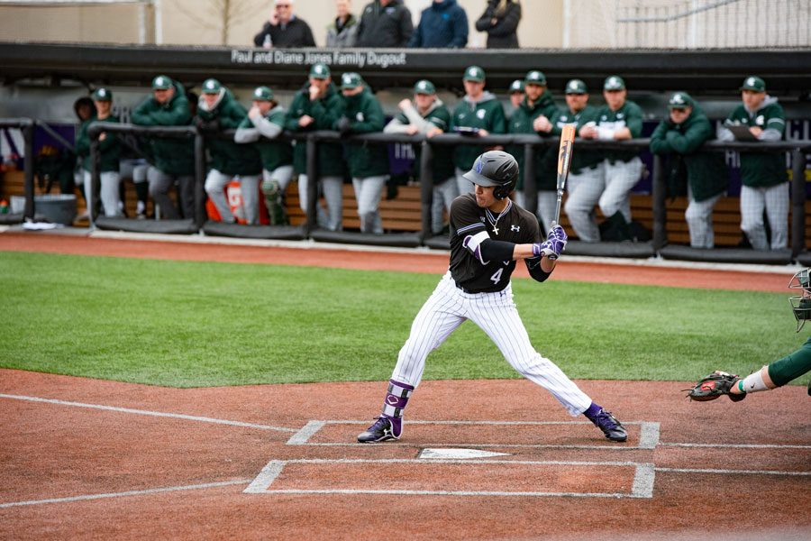 Alex Erro prepares to swing. The junior is one of four remaining starters from NU’s last trip to Ann Arbor during its 2017 Big Ten Tournament run.