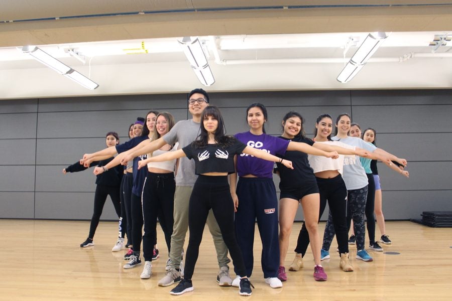 Members of Dale Duro in formation. The Latin dance crew was started last fall.