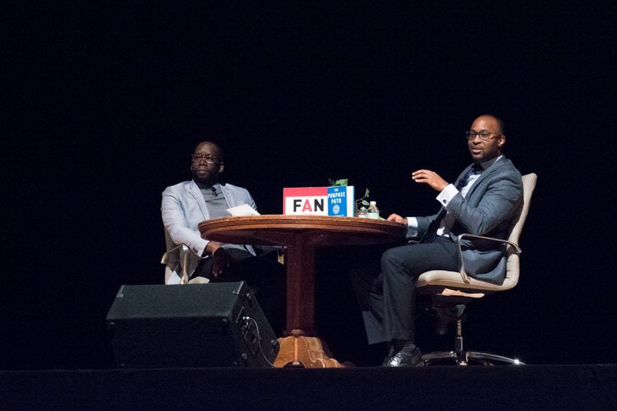 ETHS principal Marcus Campbell and author Nicholas Pearce speak at a Family Action Network event Wednesday. Pearce discussed his book, titled “The Purpose Path: A Guide to Pursuing Your Authentic Life’s Work.