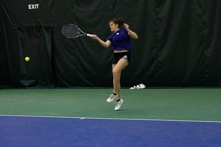 Julie Byrne hits the ball. The junior won both her singles matches in the Cats’ Big Ten defeats this weekend.
