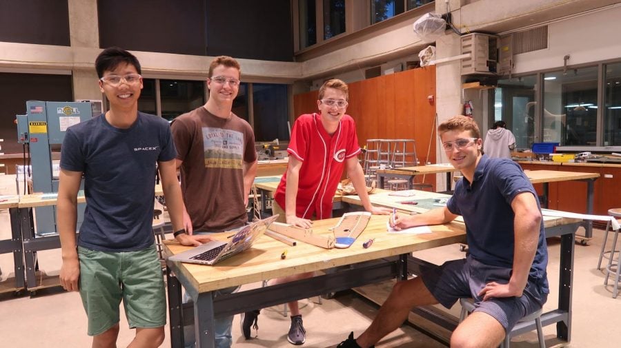 From left to right: Lawrence Luo, Griffin Williamson, Grant Bayer, and Cuyler Dull continuing their work on their plane.