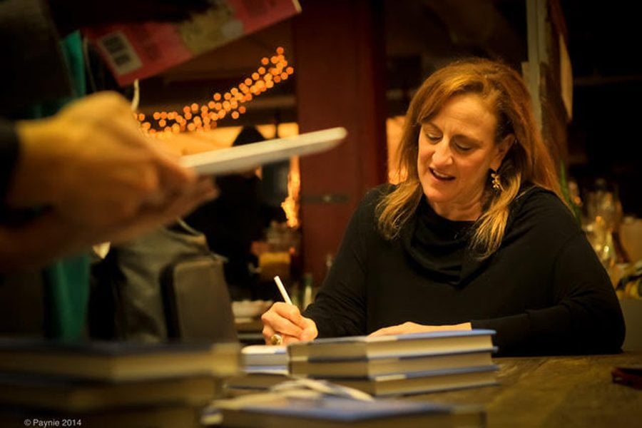 Writer, producer and director Cindy Chupack (Medill ’87) signs copies of her book, “The Longest Date: Life as a Wife.” Chupack’s new film, “Otherhood,” will be released in August on Netflix.