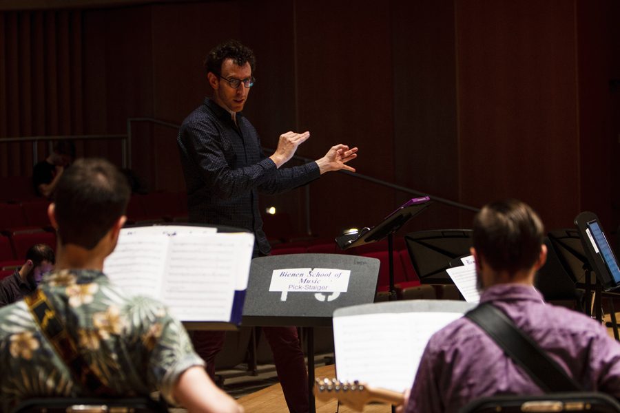 Alan Pierson leads the Contemporary Music Ensemble in rehearsal. The orchestral group will hold their final concert of the year on May 24 at Galvin Recital Hall.