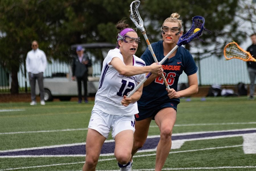 Megan+Kinna+evades+a+defender.+The+junior+and+the+Wildcats+will+look+for+another+win+over+top-ranked+Maryland+in+the+national+semifinals+Friday.