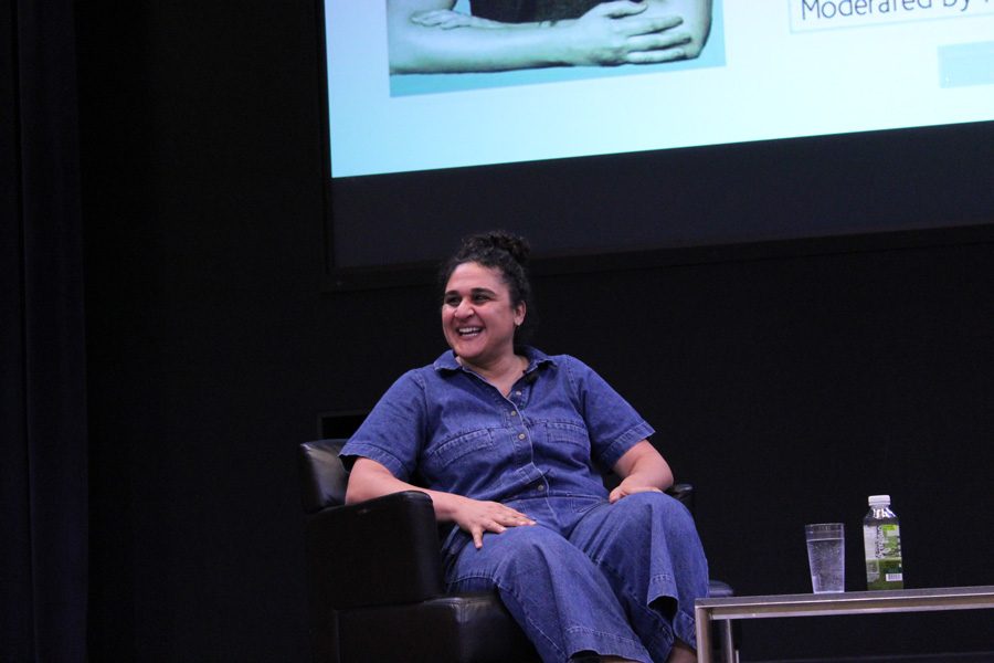 Samin Nosrat speaks in the McCormick Foundation Center auditorium. Her first cookbook, “Salt, Fat, Acid, Heat: Mastering the Elements of Good Cooking,” has been adapted into a Netflix show.