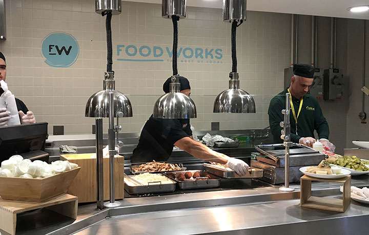 FOODWORKS workers at work. The “pop-up restaurant incubator” will be coming to Norris University Center in June.