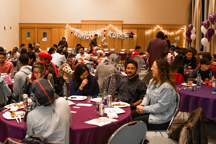 Northwestern+community+members+celebrate+the+first+day+of+Ramadan+Monday+evening.+More+than+150+people+gathered+in+Parkes+Hall+to+break+their+fast+together.+