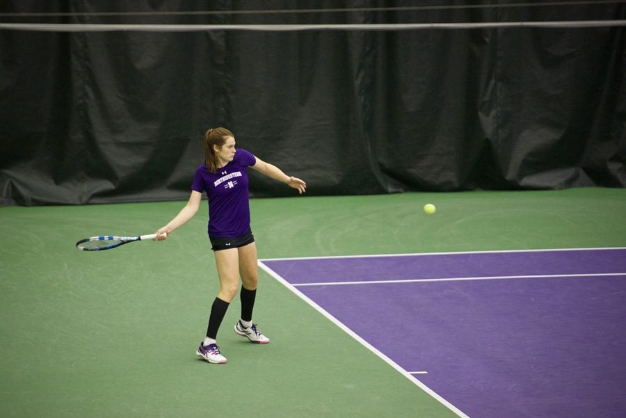 Julie Byrne hits the ball from the back. The junior was the only Wildcat to win in singles play in an NCAA Tournament loss to Princeton on Friday.