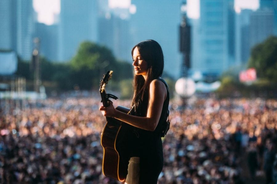 Country-pop singer Kacey Musgraves performs at sundown to a massive crowd. 