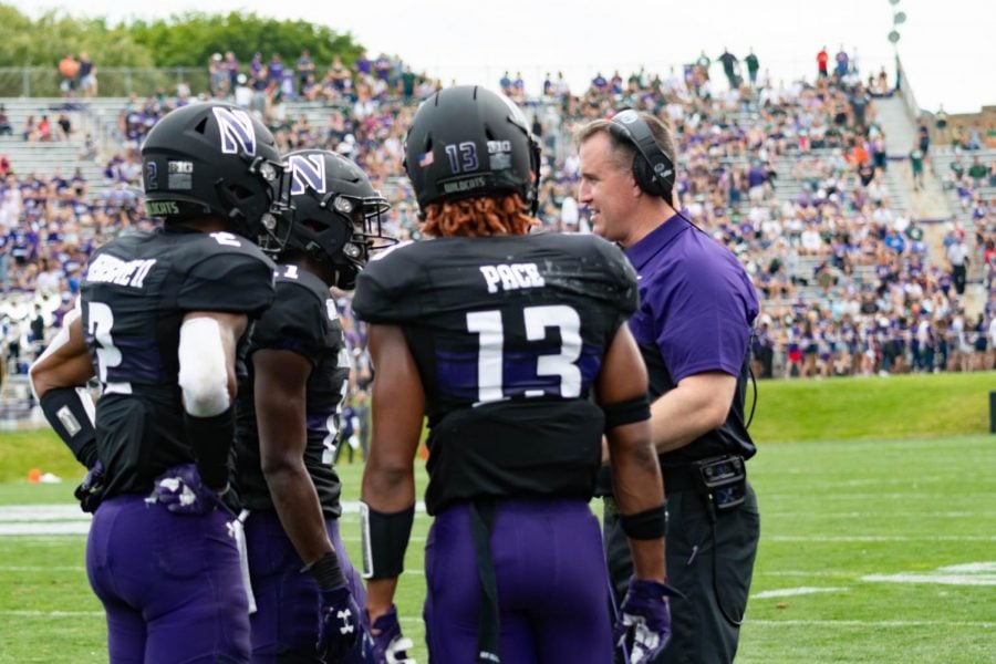 Pat Fitzgerald talks to his team. NU enters a pivotal moment in the race for the Big Ten West title this weekend against Purdue. 
